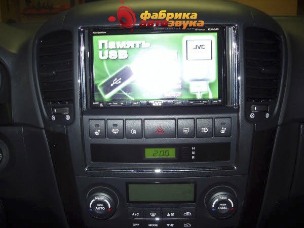 Установка магнитолы JVC JVC KW-NX7000EE Kia Sorento