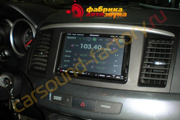 установка автомагнитолы Китайский Пионер Китайский Пионер Mitsubishi Lancer X
