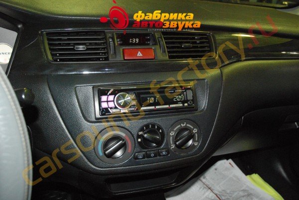 установка 1din автомагнитолы Alpine CDE-112Ri Alpine CDE-112Ri Mitsubishi Lancer