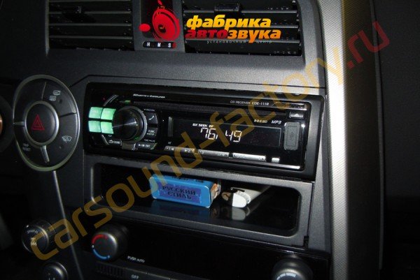 Установка магнитолы Alpine CDE-111R SsangYong Kyron